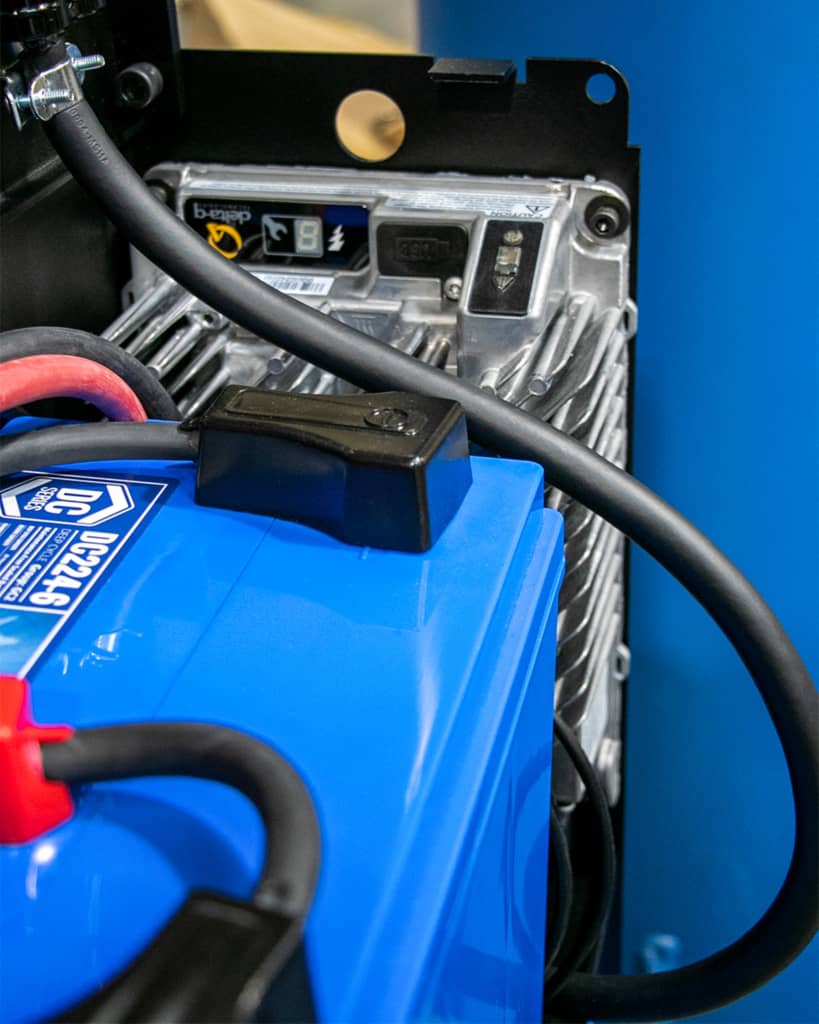 A Fullriver Battery is connected to a Delta-Q battery charger.