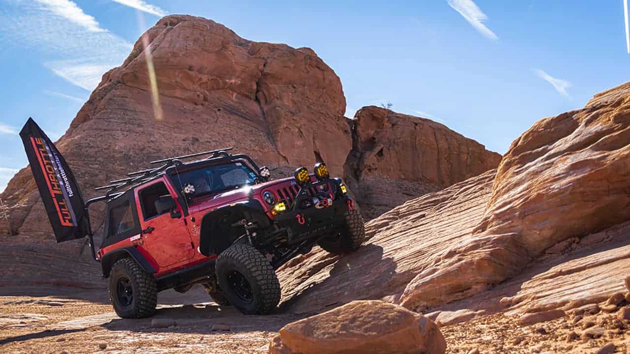 David's Jeep sits on a rock slope prior to ascending The Chute.